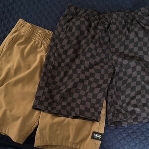 Black Checkerboard & Tan Vans vanphibian shorts.